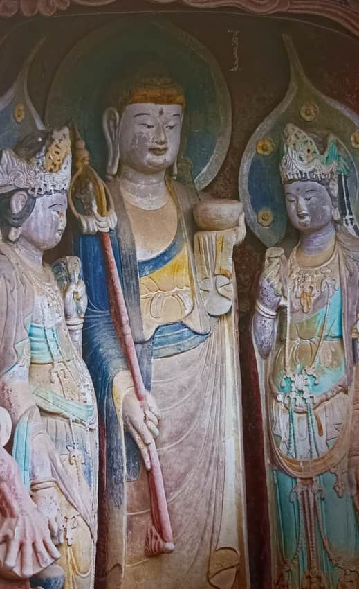 Standing central figure and crowned attendants at Shuining Temple
