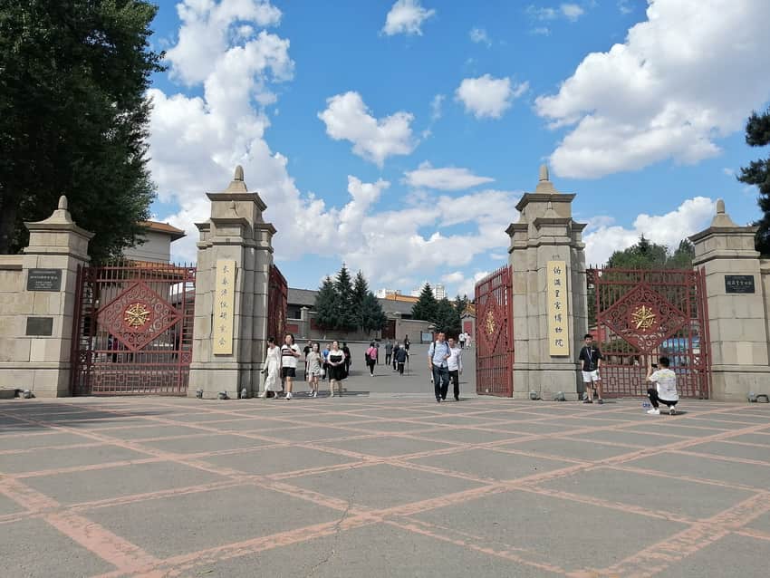 Visitors at Laixun Gate of the former puppet-state palace museum