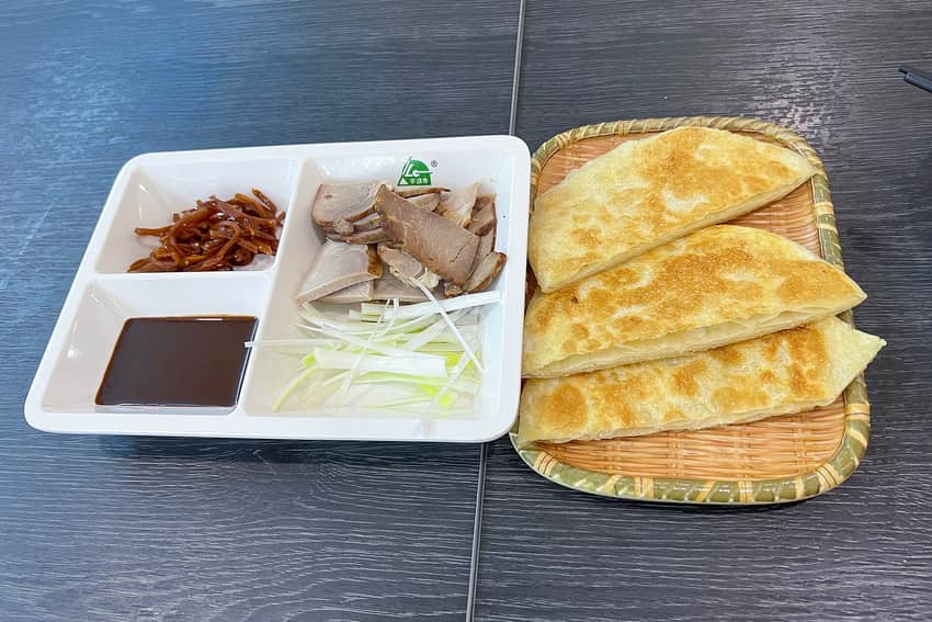Regional Jilin serving of smoked meat and layered bing