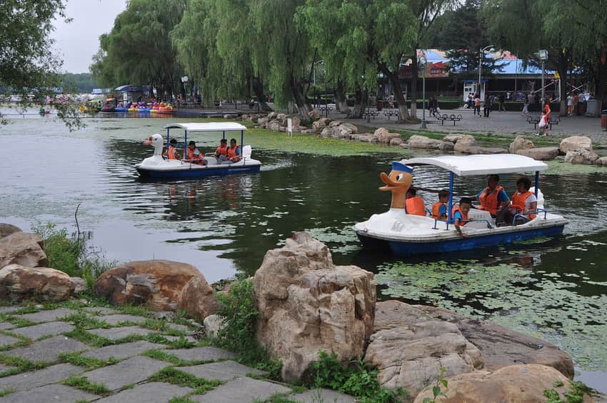 Families boating on South Lake in Changchun