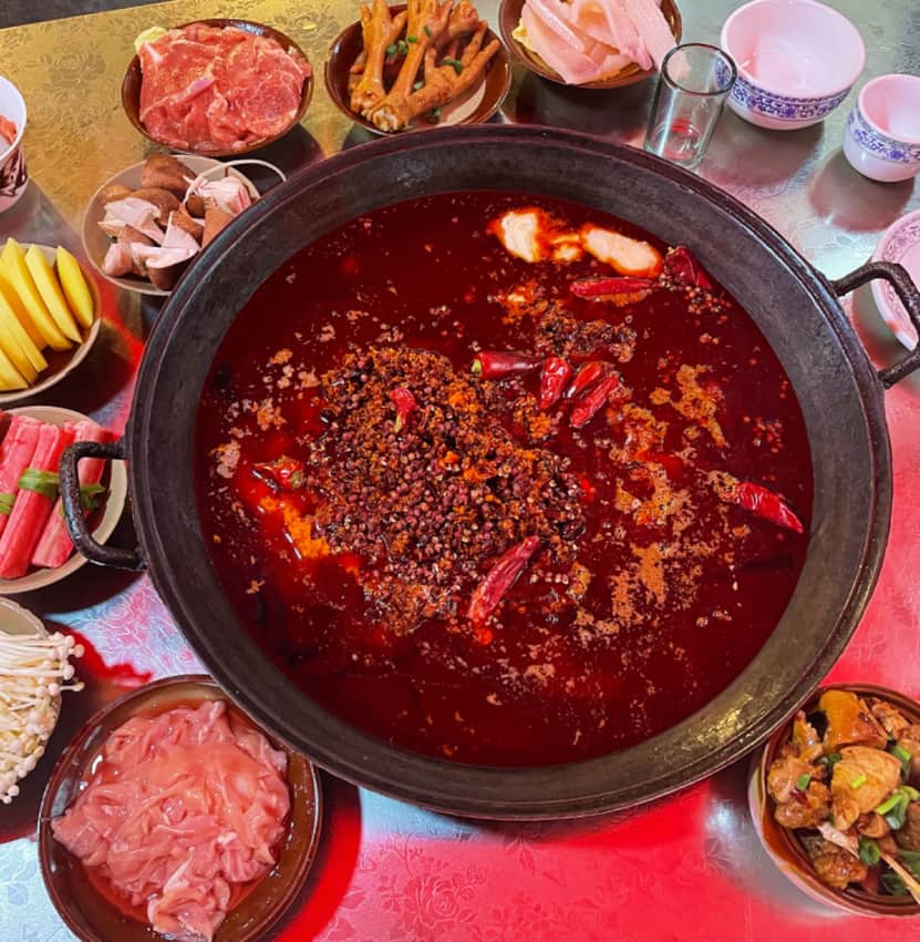 Chengdu hot-pot table with shared ingredients