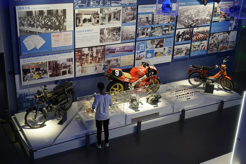 Transport and industrial-history exhibits inside Chongqing Industrial Museum