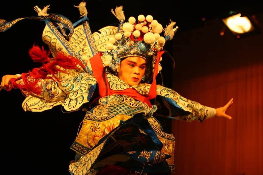 Costumed Sichuan-opera performer on a Chongqing stage