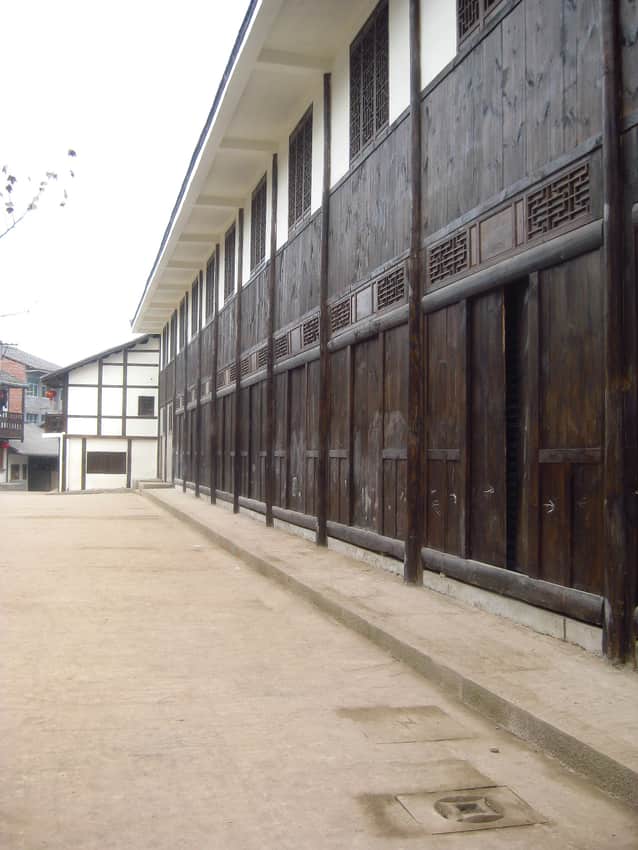 Long timber frontage and lattice windows on a Shiqiao street