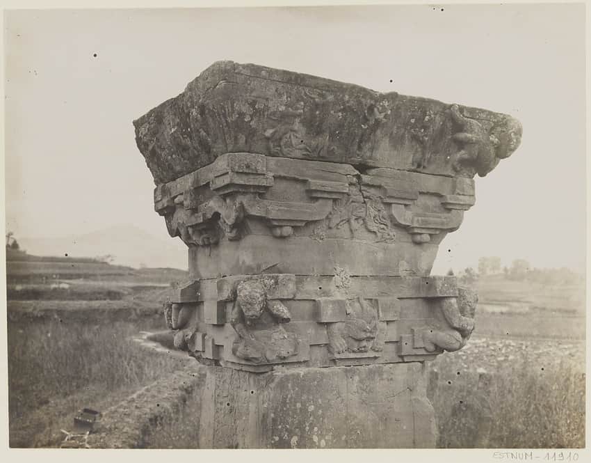 Archival close view of a carved Qu County stone gate-tower capital