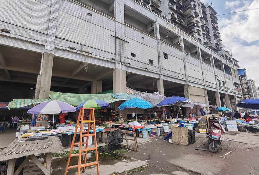 Produce stalls outside Xiangyang Community market in Dazhou