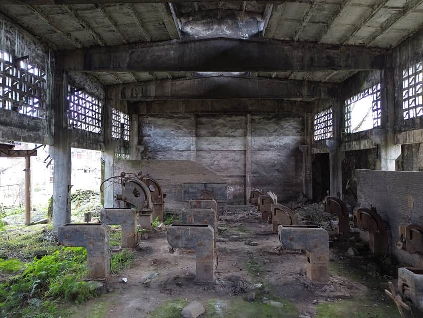 Disused concrete workshop with machine bases at Beiba in Sanhui