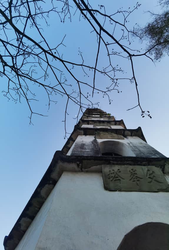 Low-angle view up the weathered Wenfeng Pagoda at Sanhui