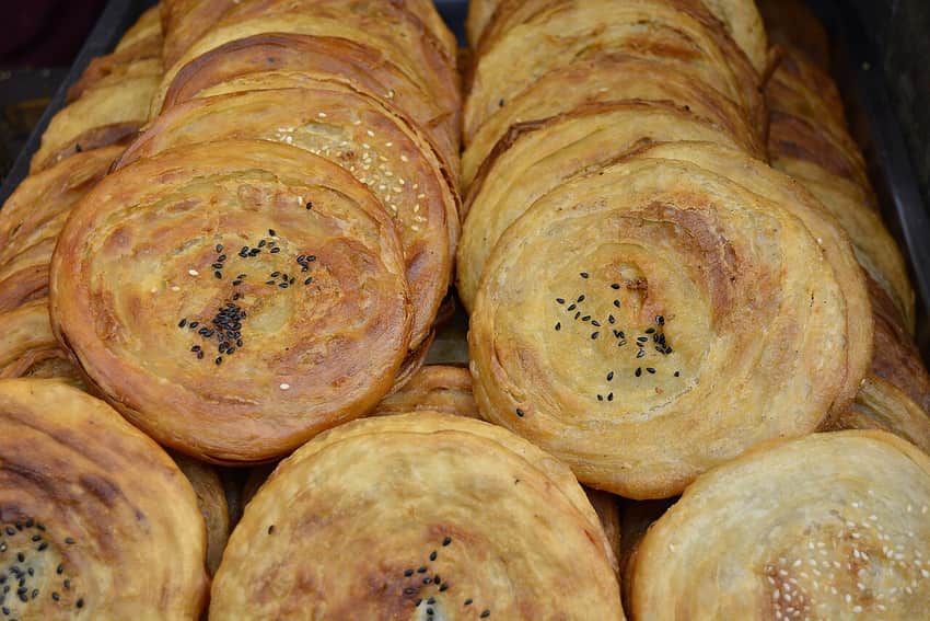 Context photograph of guokui flatbreads, not a Deyang vendor