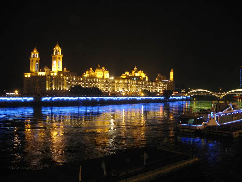 Night view across the Min River toward Zhongzhou Island in Fuzhou