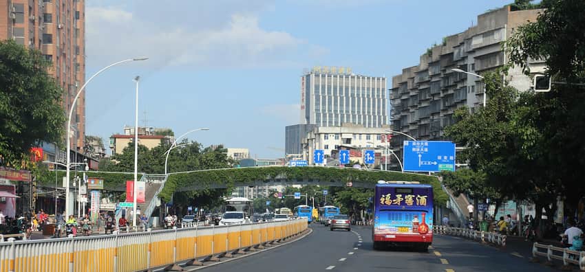 Dated street view with traffic and pedestrians on Shangsan Road in Fuzhou