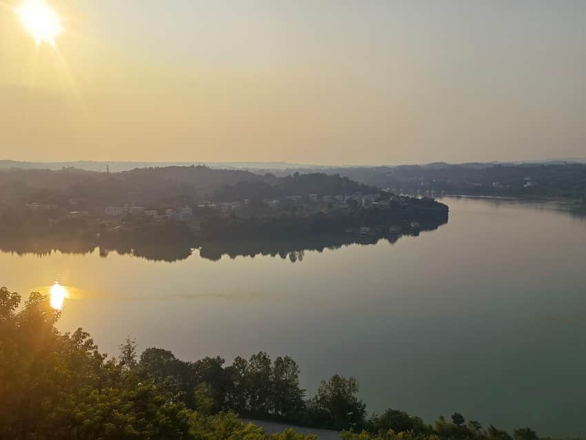 Sunset over a Jialing River bend and settlement in Wusheng