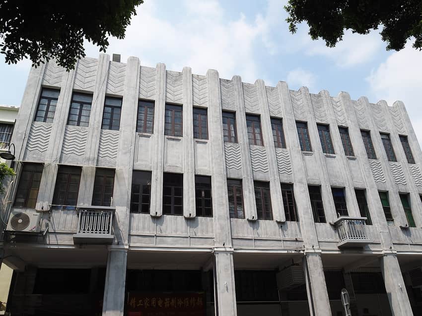 Geometric grey facade of a listed Enning Road building