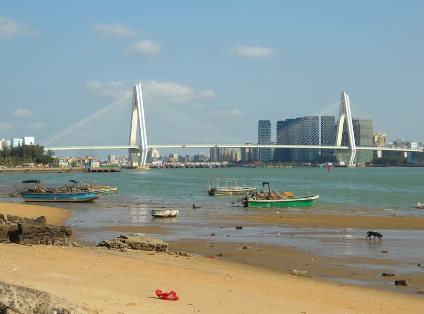 Century Bridge crossing the Haidian River mouth at low tide