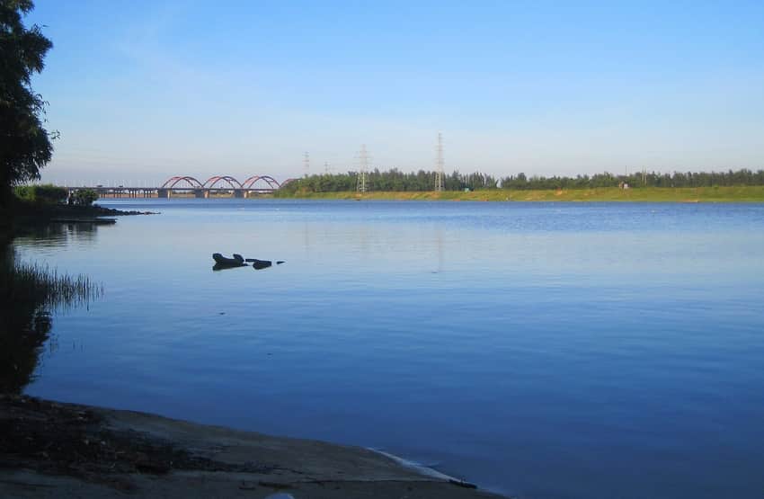 Nandu River, bridge and wooded banks inside Haikou Municipality