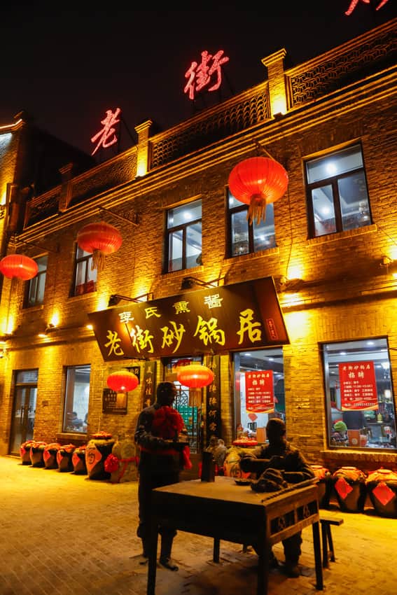 Lantern-lit restaurant frontage on Chinese Baroque Street