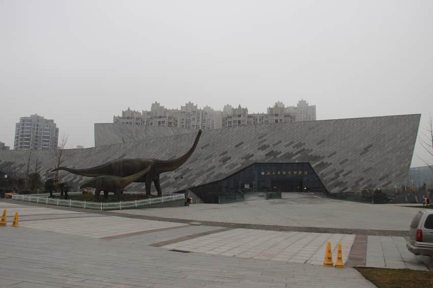 2012 exterior of a geological museum in Hefei with dinosaur display models