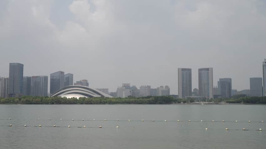 Wide 2019 view of Hefei Grand Theatre and towers beside Swan Lake