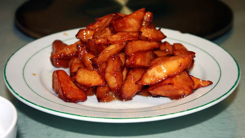 Glossy candied sweet-potato pieces served in Jinan