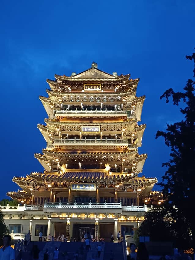 Illuminated present-day Chaoran Tower beside Daming Lake