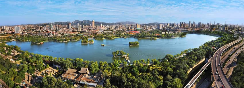 Panoramic Daming Lake with islands and Jinan skyline