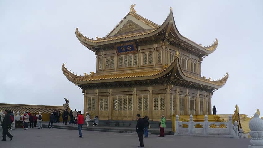 Golden Summit building on Mount Emei under a pale sky