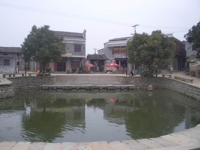 Pond and historic-village setting in Luotian, Anyi County