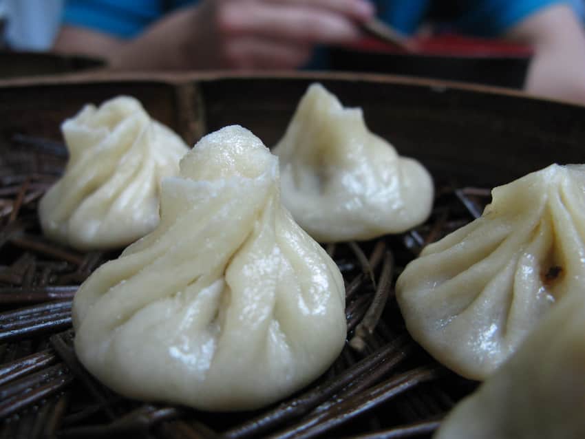 Close view of steamed chicken-broth soup buns served in Nanjing