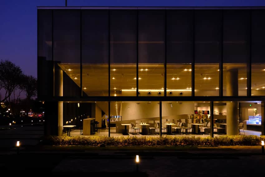 Contemporary glass entrance of Nanjing City Wall Museum at dusk