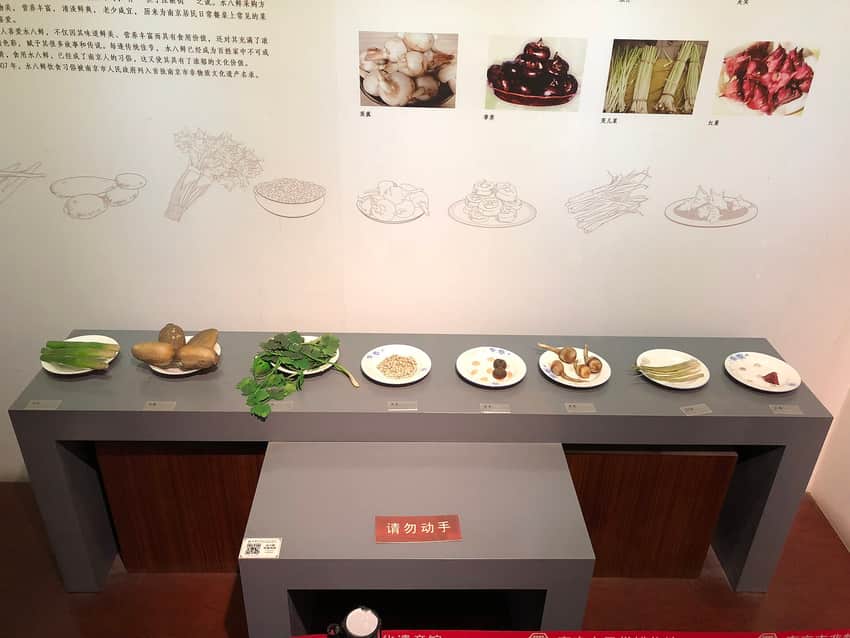 Museum display explaining Nanjing's water eight delicacies food custom