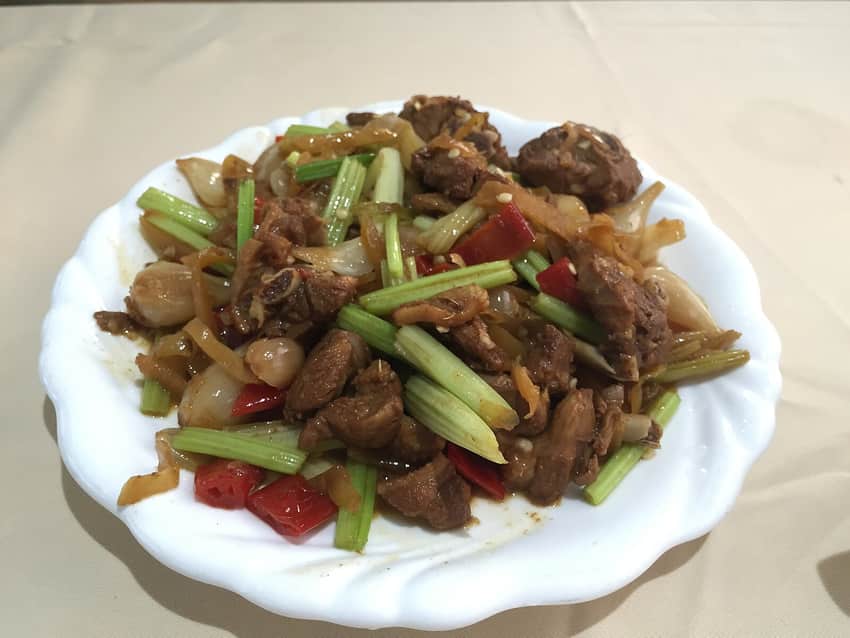 One plated serving labelled Guangxi lemon duck