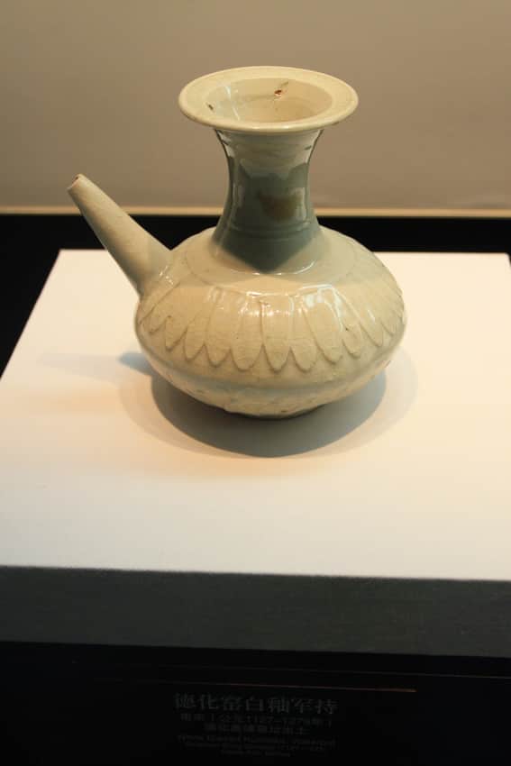 Pale crackled-glaze Southern Song Dehua vessel in a museum display