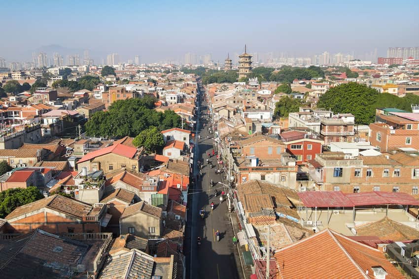 Elevated view along West Street toward Kaiyuan Temple pagodas and modern buildings