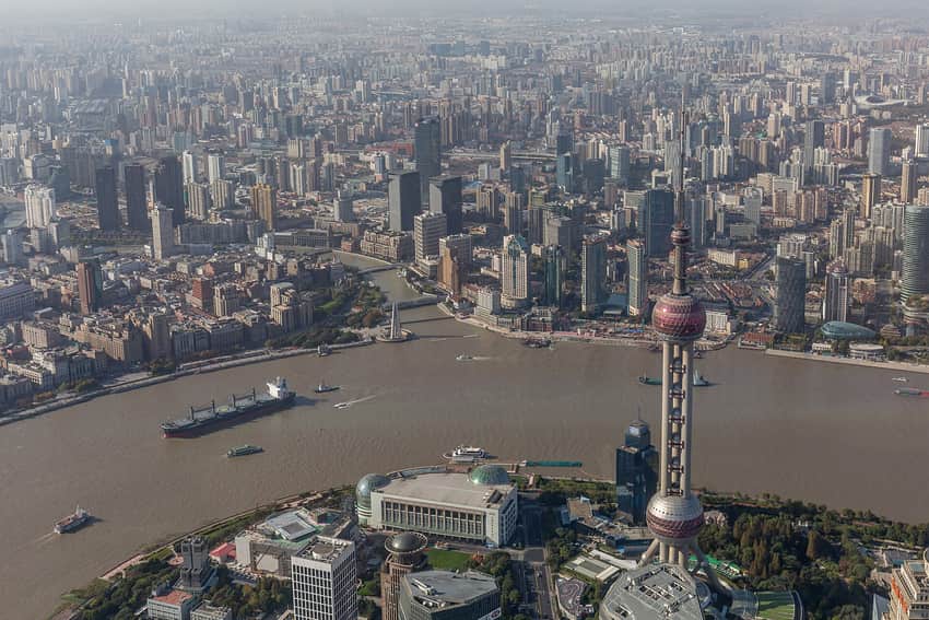 Aerial view over the Oriental Pearl Tower, Huangpu River, the Bund and Suzhou Creek