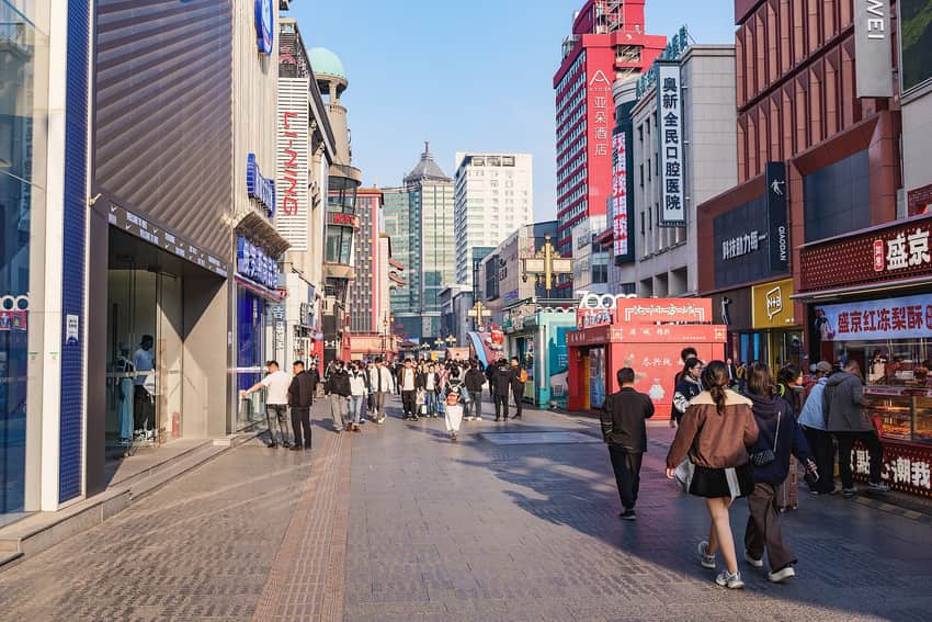 Busy 2026 Zhongjie pedestrian street with shops, kiosks and pedestrians