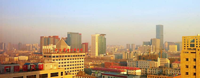 Hazy 2012 panorama of towers and roads in central Shijiazhuang