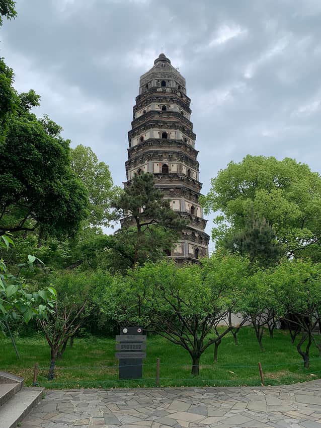 Yunyan Pagoda rising above trees on Tiger Hill