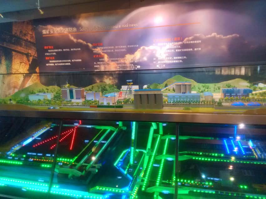 Interpretive surface and underground coal-mine safety model in a museum display
