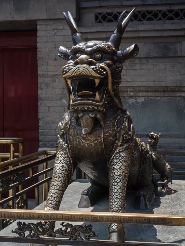 Bronze mythical-animal statue in the courtyard of Tianhou Palace in Tianjin