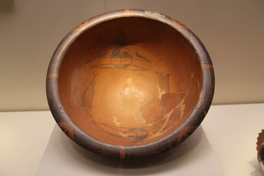 Repaired Banpo painted basin with human-face and fish designs