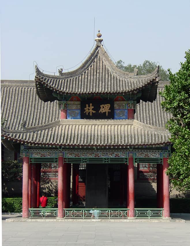 Tiled Beilin pavilion with a dark stone stele visible inside