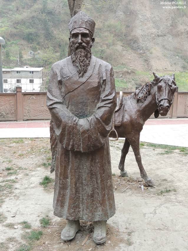 Contemporary Armand David statue used for natural-history interpretation in Baoxing