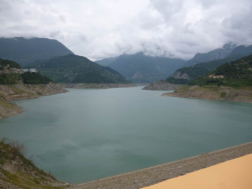 Highland water and mountain slopes at Qiaoqi Lake in Baoxing