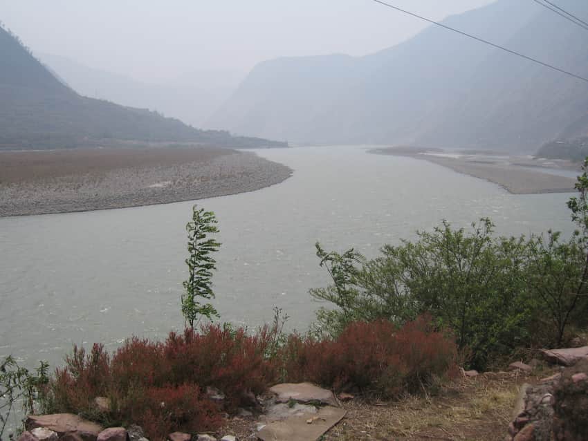Dadu River gravel bars and steep valley walls in Hanyuan