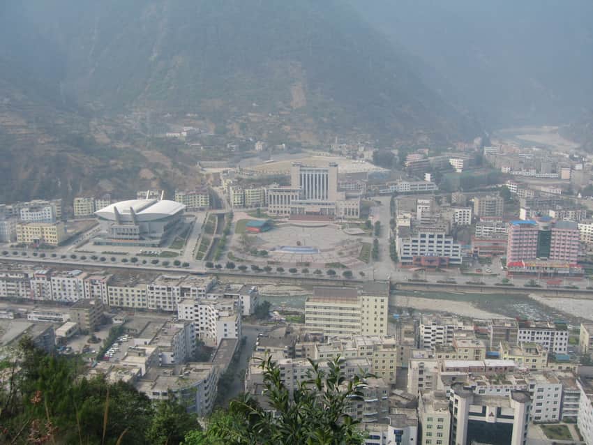 Compact Shimian town within a steep mountain valley