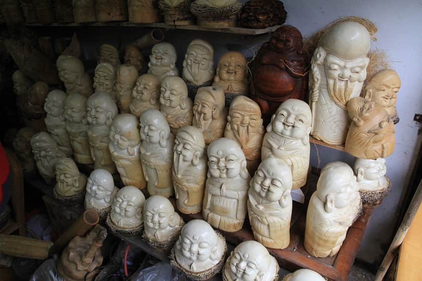 Bamboo-carved figures displayed in the Shunan Bamboo Sea area