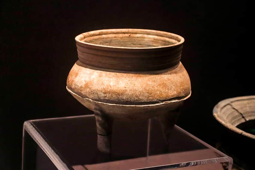 Red pottery ding attributed to Dahecun Site in a museum display