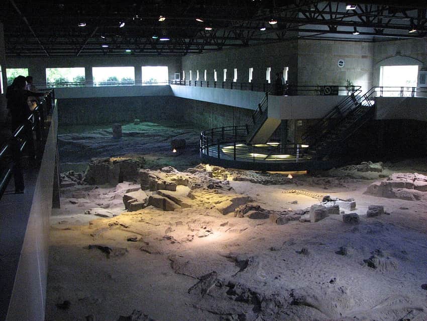 In-situ fossil excavation pit at Zigong Dinosaur Museum