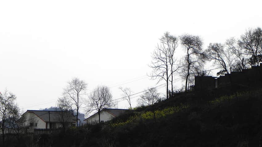Dated rural hillside settlement in Anyue County