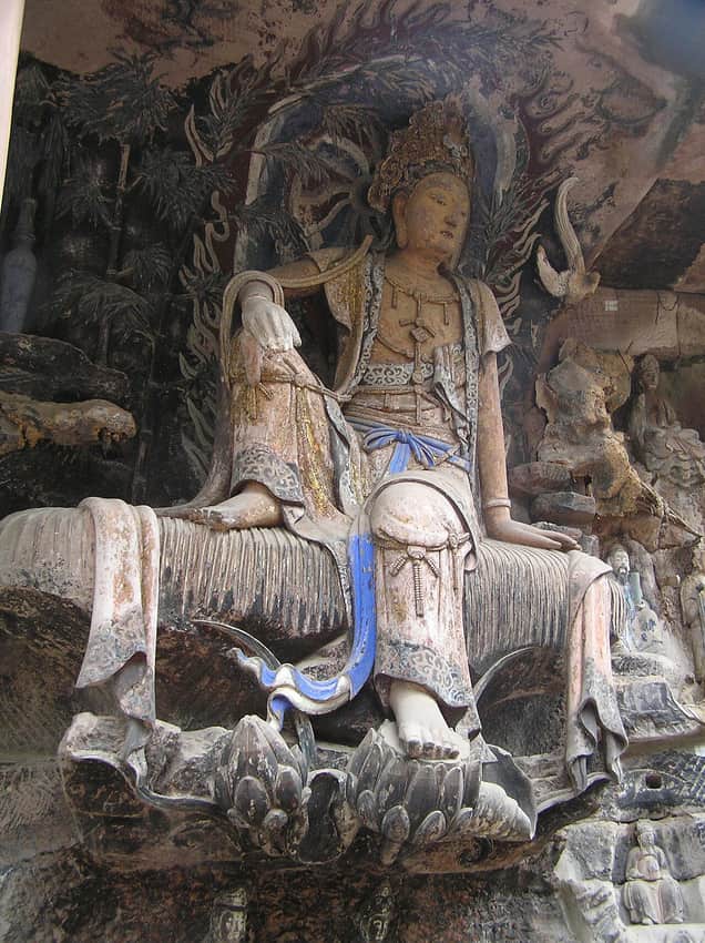 Tall painted Zizhu Guanyin figure at Pilu Cave